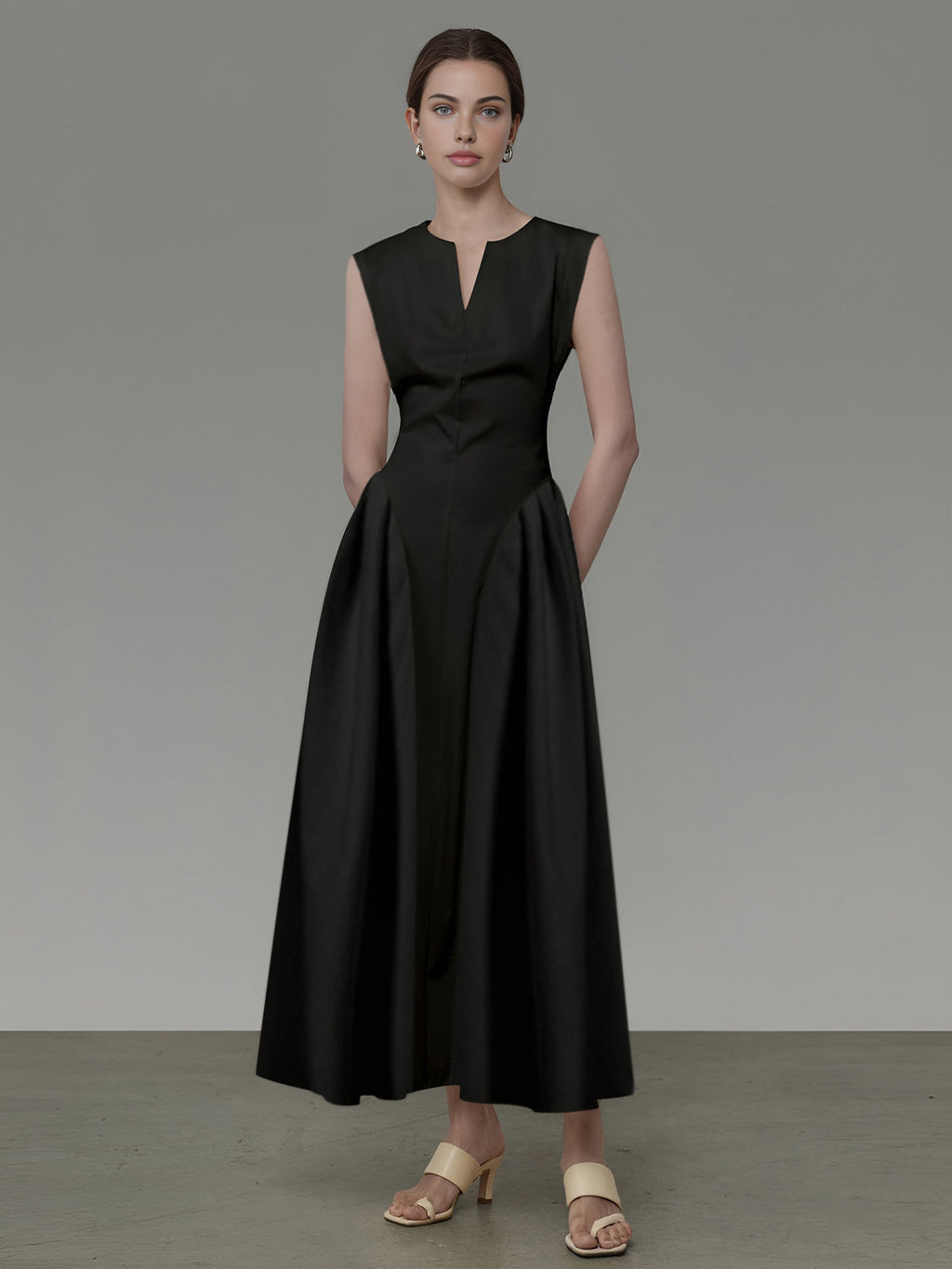 Robe Midi Noire Sans Manches Avec Taille Cintrée Et Jupe Évasée Pour Femmes | Adaptée Aux Tenues Formelles
