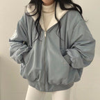 Manteau Matelassé à Capuche avec Fermeture Éclair et Design Double Face pour Femme | Idéal pour l’Hiver